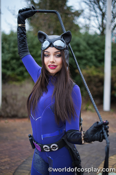 Cat Woman cosplay. @evilamelia.cosplay photographed outside MCM Birmingham Comic Con March 2019.