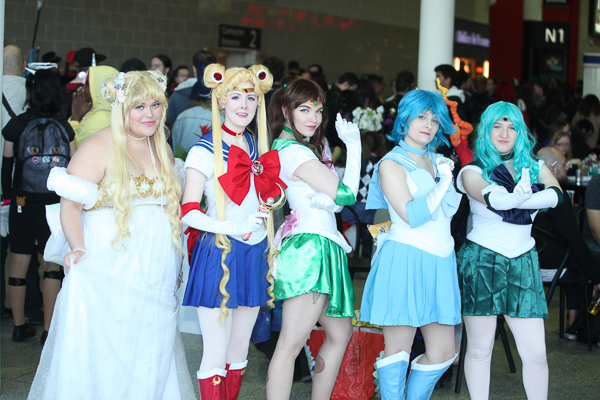 Five friends wearing anime-inspired costumes at MCM London Comic Con May 2018.